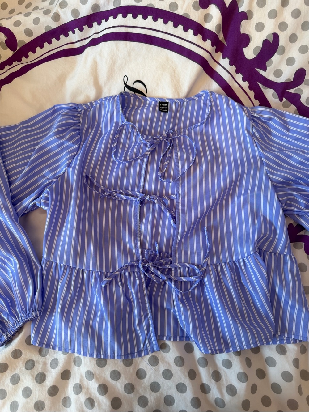 Light Blue and White Striped Tie-Front Peplum Blouse